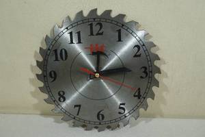 lot 137 image: Illinois Industrial Tool Saw Blade Clock