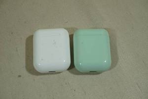 lot 209 image: 2 Vivitar Wireless Earbuds -White & Teal