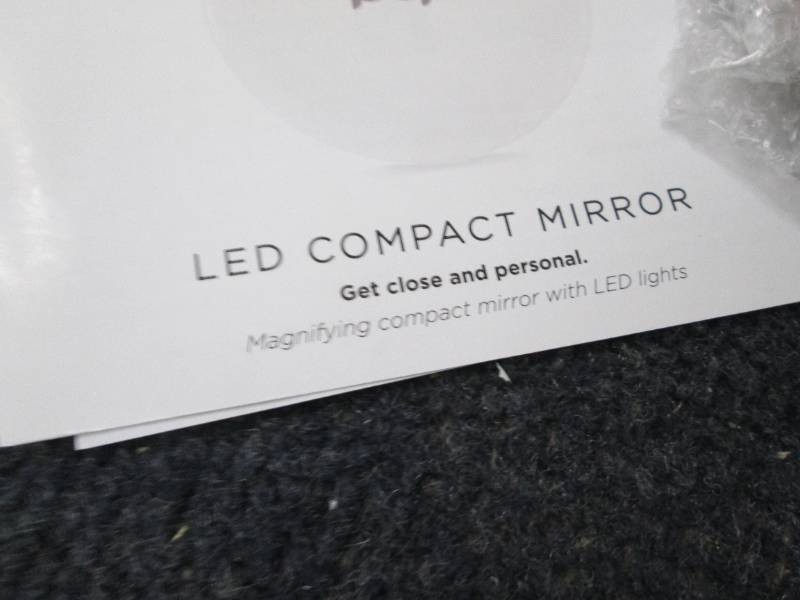 lot 64 image: Pop Sonic Compact LED Lighted Mirro...