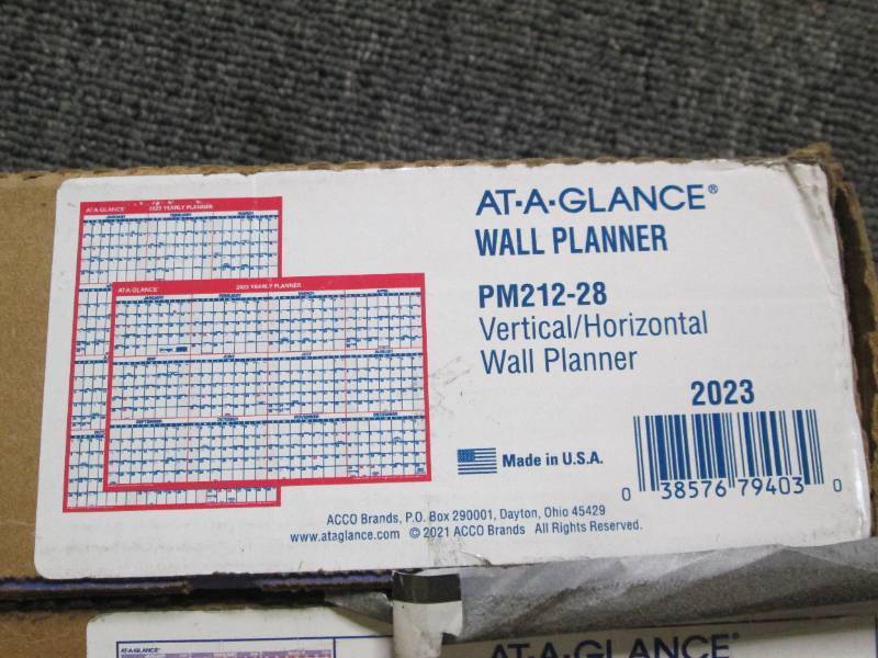 lot 176 image: 2 yearly wall calendars 24x36...