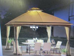 lot 31 image: Sunjoy 10-12 x 13 Gazebo open bo...