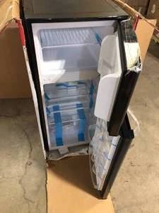 lot 4 image: Magic Chef 4.5 cu. ft. 2 Door Mini Fridge in Black with Freezer  Customer Returns See Pictures