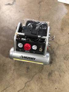 lot 30 image: Husky 1 Gal. Portable Electric-Powered Silent Air Compressor   Customer Returns See Pictures
