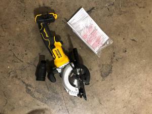 lot 39 image: DEWALT ATOMIC 20V MAX Cordless Brushless 4-12 in. Circular Saw (Tool Only)  Customer Returns See Pictures