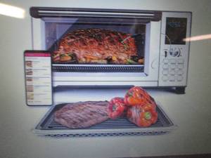 lot 27 image: NuWave Bravo XL 1 Cu. Ft. Smart Ove...