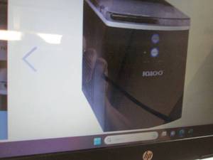 lot 34 image: Igloo 33-Lb. Ice Maker - Black out ...
