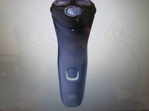 lot 75 image: Philips Norelco Dry Electric Shaver...
