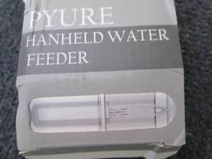 lot 80 image: Pet Life PYURE Handheld Travel Filt...
