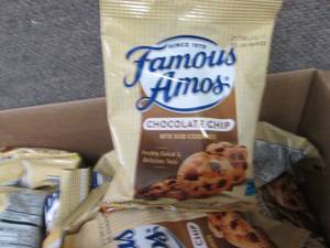 lot 102 image: Case of 42-2 oz Pouches Famous Amos...