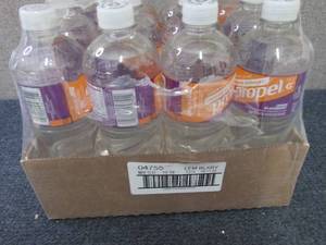 lot 114 image: 12- 24 oz Bottles Propel Lemon Blac...
