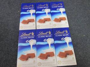 lot 226 image: 6- 4.4 oz Lindt  Milk Chocolate...