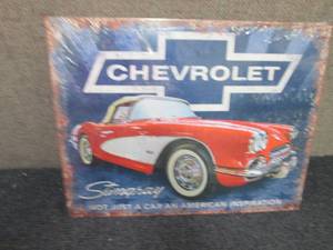 lot 327 image: Metal Chevrolet Stingray Sign 16x12...