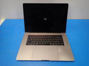 lot 25 image: Apple&nbspMacBookPro14,3 A1707 MPTR2LLA &nbspINTEL(R) CORE(TM) I7-7700HQ CPU  2.80GHZ  16GB LPDDR3 SDRAM  251GB HD  15.0 screen with 3360 x 2100 2k Resolution  unit has a few scratches  Includes IOS  no power cable