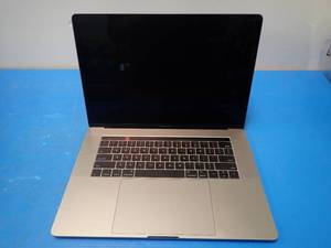 lot 27 image: Apple&nbspMacBookPro14,3 A1707 MPTR2LLA &nbspINTEL(R) CORE(TM) I7-7700HQ CPU  2.80GHZ  16GB LPDDR3 SDRAM  251GB HD  15.0 screen with 3360 x 2100 2K resolution  NO BATTERY  no cables
