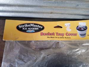 lot 57 image: Strike master bucket lid and ice fishing rod