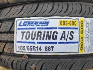 lot 129 image: Brand New Touring AS 18565R14