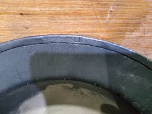 lot 150 image: British WWII steel helmet