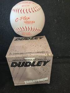 lot 31 image: Under Armour Head Gear & Brand New Dudley Official Softball