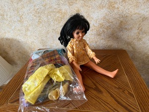 lot 91 image: Krissy Doll with homemade clothes
