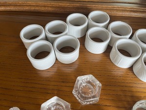 lot 76 image: Napkin rings and little containers