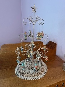 lot 18 image: 21pc Goebel Figurines and tree some boxes