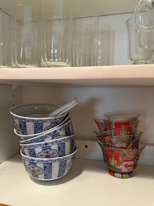 lot 60 image: Glass ware both shelves