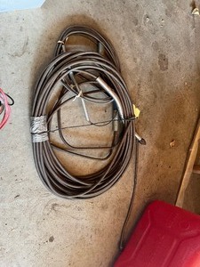 lot 44 image: drain snakes and concrete tools