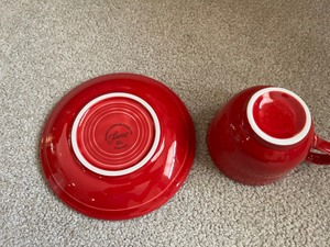 lot 95 image: Red Fiesta ware 8 cups and saucers