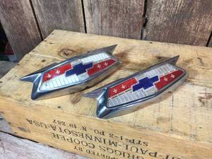 lot 201 image: 1954 Chevy Bel Air Hood - Trunk Emblems
