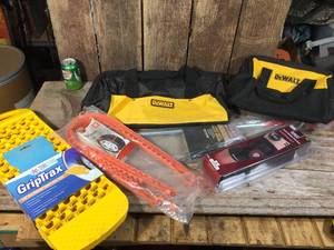 lot 299 image: Dewalt - Knee Brace - Plumbing Auger - Tire Traction