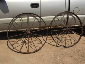 lot 32 image: Antique Pair Wagon Wheels