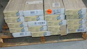 lot 22 image: 20 Case Lot 484 SQ Feet Total TrafficMaster Lakeshore Pecan Stone 7 mm T x 7.6 in. W Laminate Wood Flooring (24.2 sq ftcase)  Model # 50560 UPC Code #  698829022305