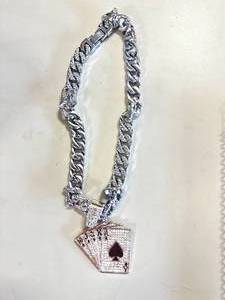 lot 63 image: New Poker Hand Necklace