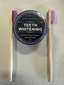 lot 86 image: Charcoal Tooth Powder & Toothbrushes