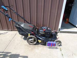 lot 100 image: Craftsman self propelled mower with bag. Has electric start but no battery. Tested & works. As shown.