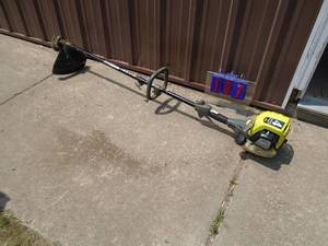 lot 107 image: Ryobi 4 cycle weed trimmer. Used condition. Tested & works. As shown.