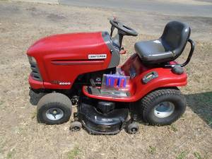lot 108 image: Craftsman 22 hp twin riding mower. 42 deck. Good overall condition. Seems to need a new belt drive mover eratically. As shown.