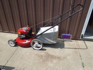 lot 110 image: Craftsman push mower with bag. Used condition. Tested & works. As shown.
