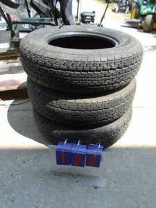 lot 120 image: Qty of 3 trailer tires. 20575r15. Looks like about 12 tread. As shown.