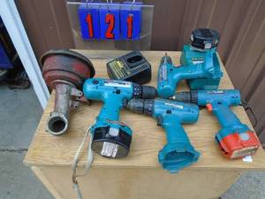 lot 121 image: Group of Makita drills & chargers. As shown.