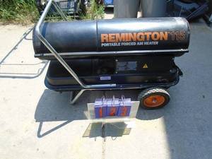 lot 123 image: Remington 115 oil filled heater. Looks very little use. As shown.