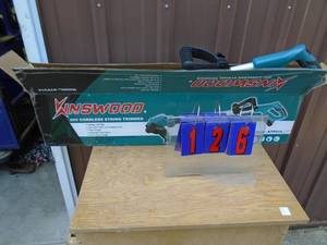 lot 126 image: New Kinswood 20 volt cordless weed trimmer with battery & charger. Was a show display. As shown.