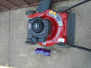 lot 128 image: MTD push mower. Good used condition. Real clean. Tested & works. As shown.