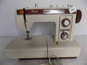 lot 75 image: Vintage Portable Sewing Machine