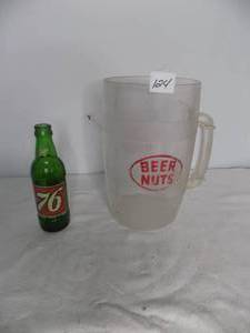 lot 124 image: Glass Bottle Drink Ice Cold 76,& Beer Nuts  Pitcher