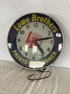 lot 79 image: 18 12 Clock Lowe Brothers Paints & Varnishes