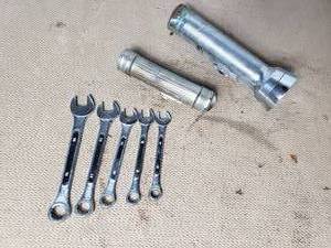 Old Flashlights and Wrenches