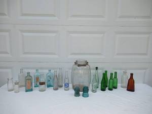 lot 61 image: Assorted Vintage Bottles Vintage Soda bottles, Vintage Drug Store Bottle, Vintage Pickle Jar, Telephone Pole Insulators.