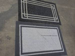 2 Accent Rugs 30 x 45- 1 has a fla...