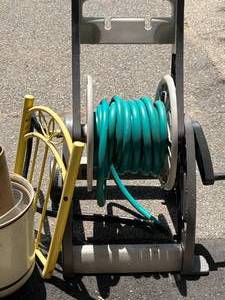 lot 11 image: Garden Hose and Reel & Planters